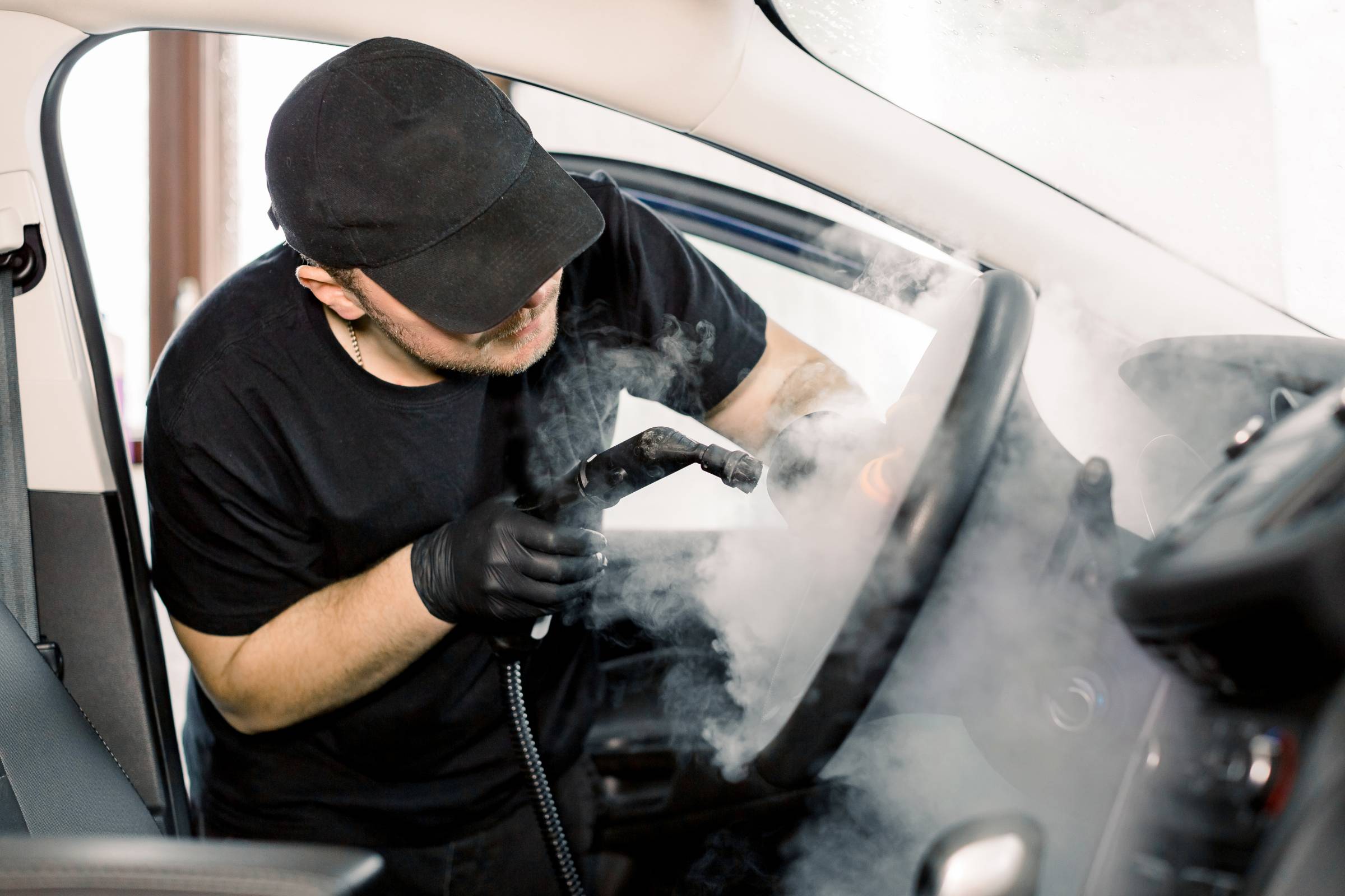 Glossy vehicle exterior after careful detailing and paint finish care
